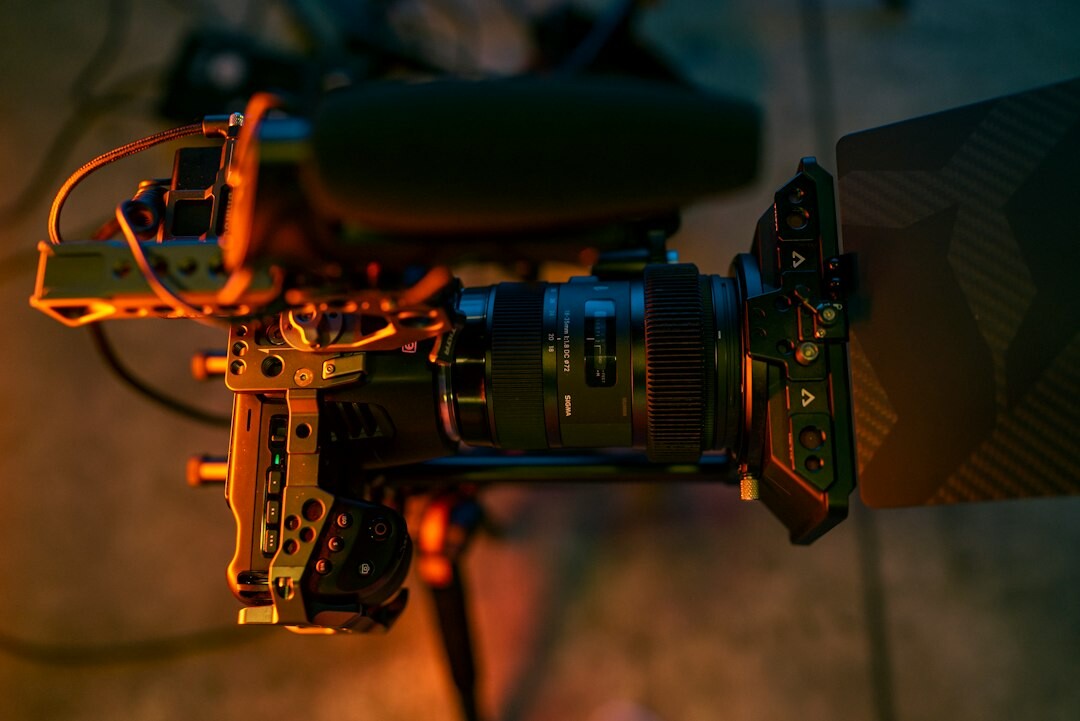 Close-up of a professional broadcast camera lens and rig